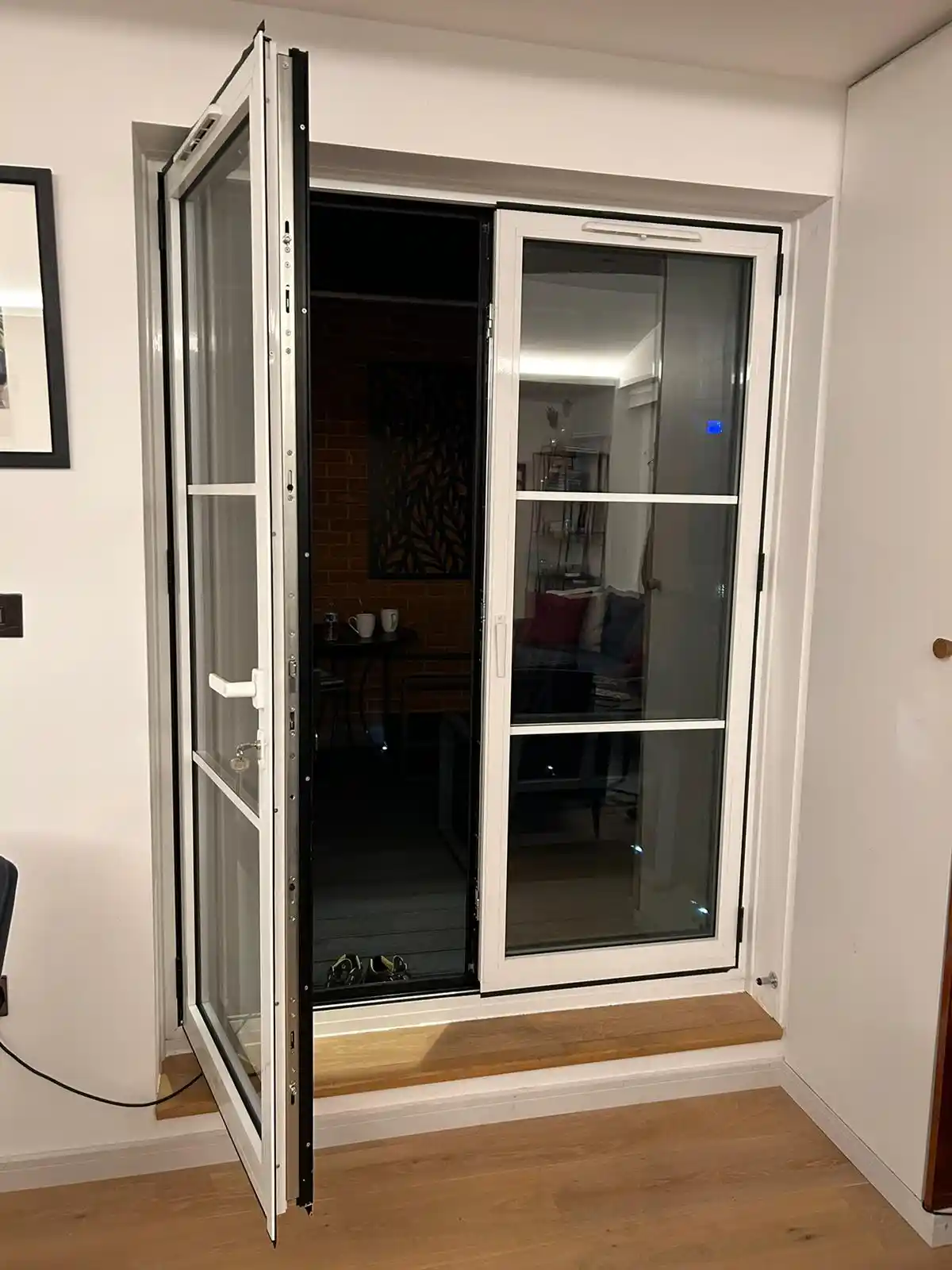 White aluminium French door with glazing bars installed by Bucks Glazing