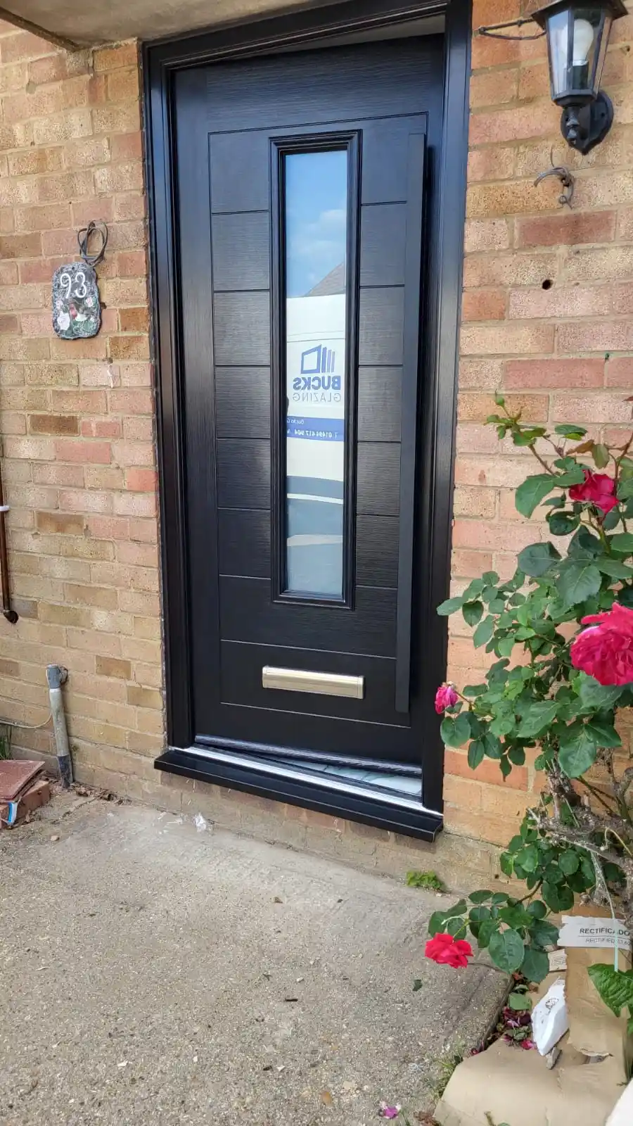 Grey composite door fitted by Bucks Glazing