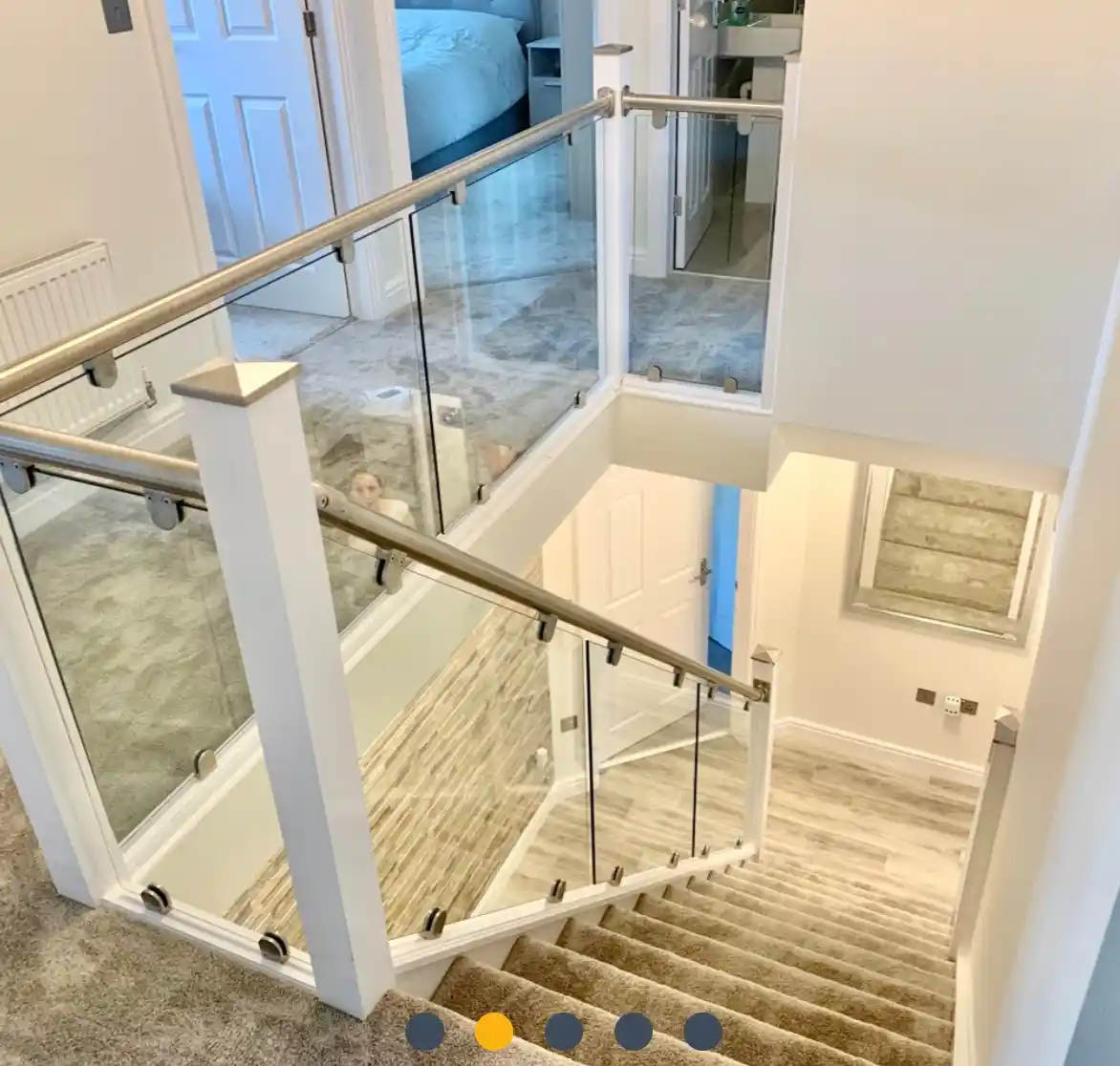 Glass balustrade staircase fitted by Bucks Glazing