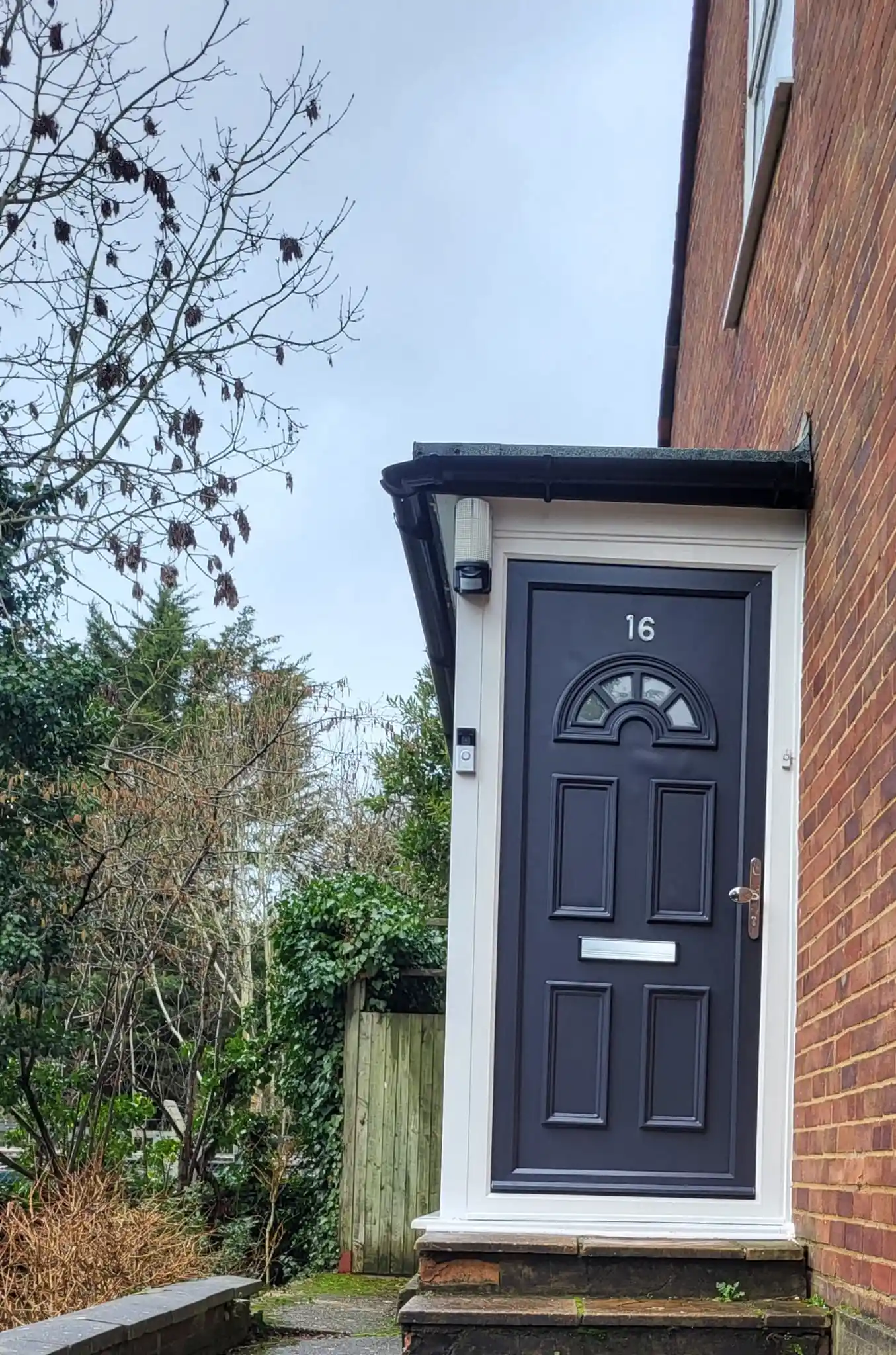 Anthracite UPVC front door with fan light installed by Bucks Glazing